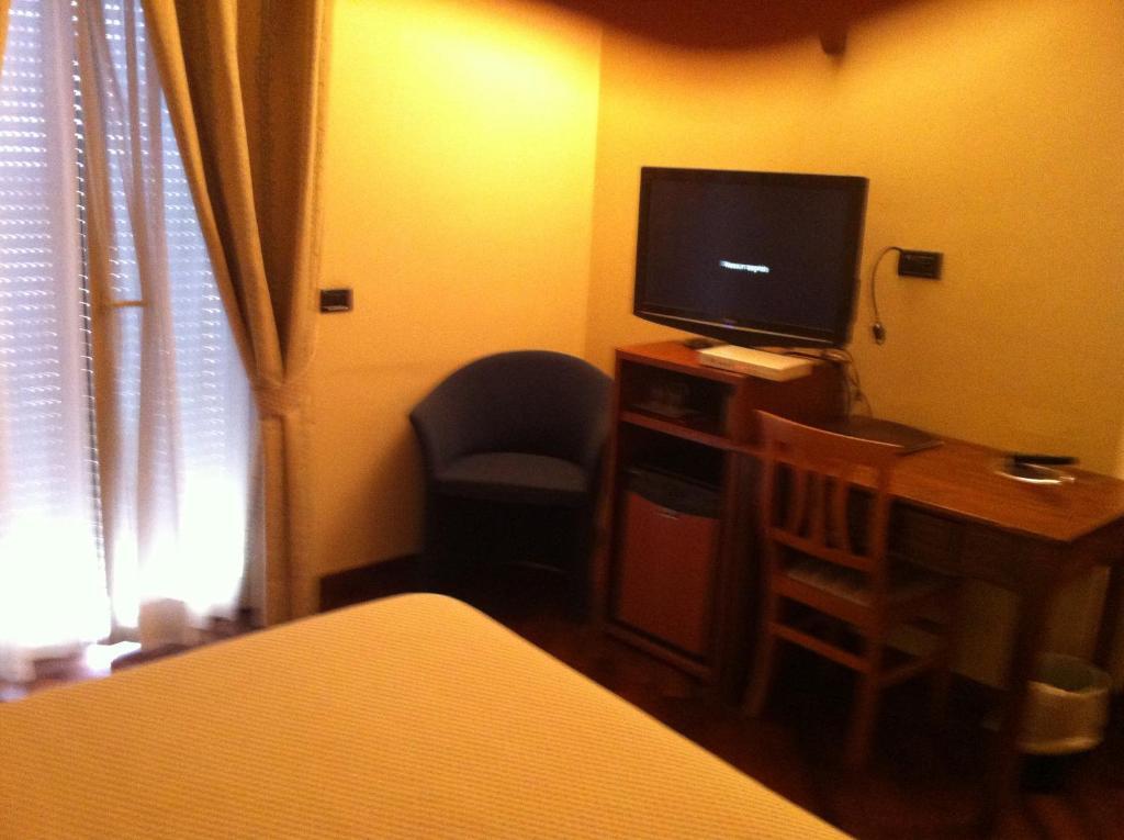 Hotel Il Cigno Perugia Szoba fotó